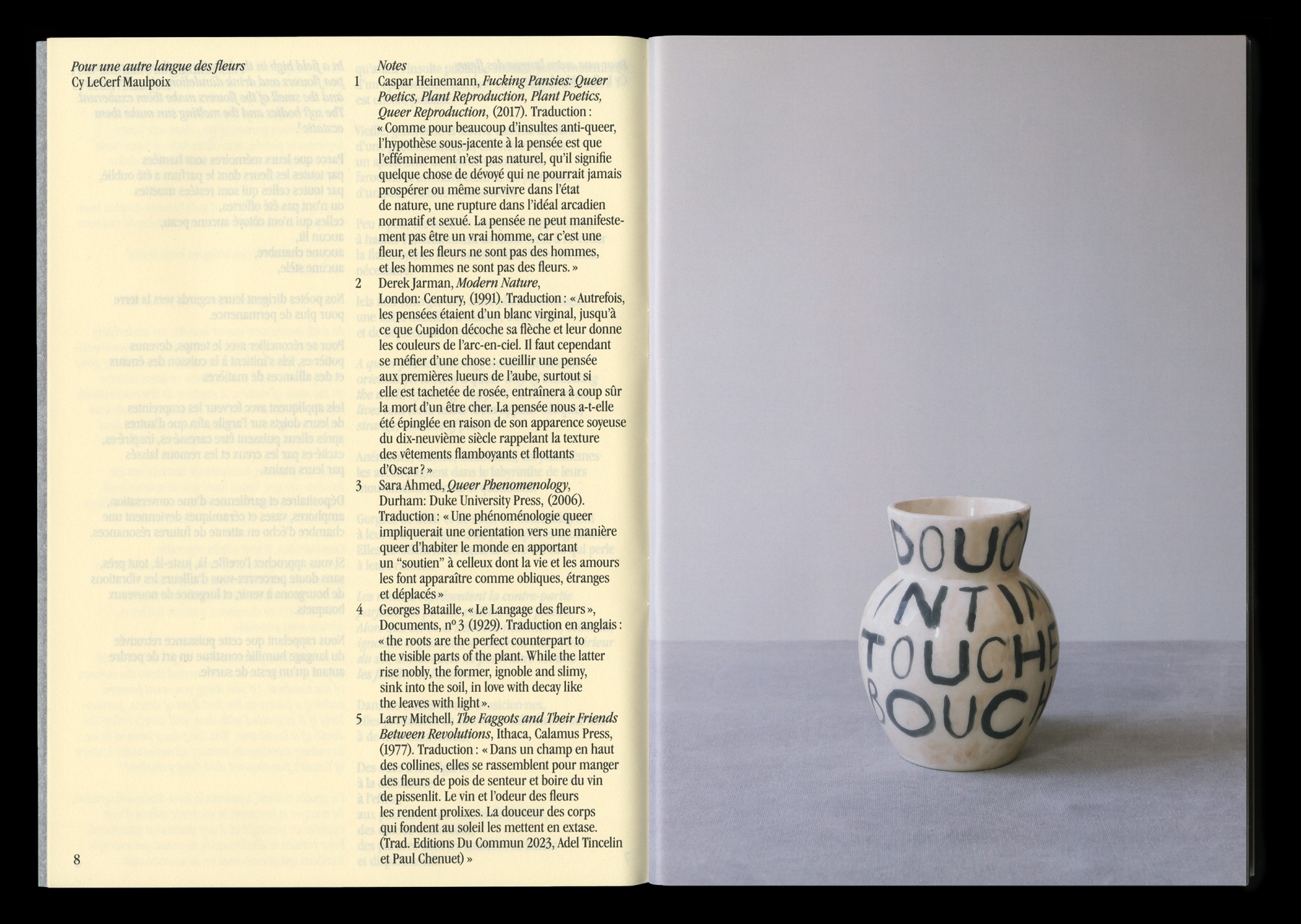 Seven vases filled with flowers 6